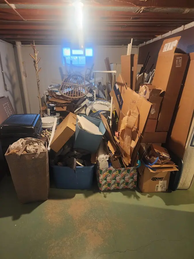 Roll-off dumpster container at job site for Yard Waste Dumpster Rental in Brownfields